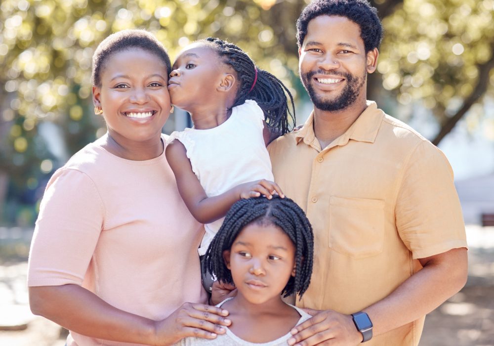 Black family, outdoor fun and smile of parents bonding and spending free time with their children o.